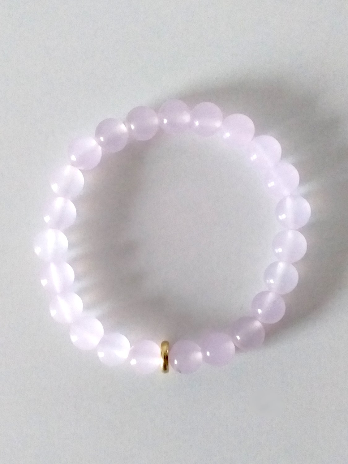 Rosa agat armbånd med forgyldt perle